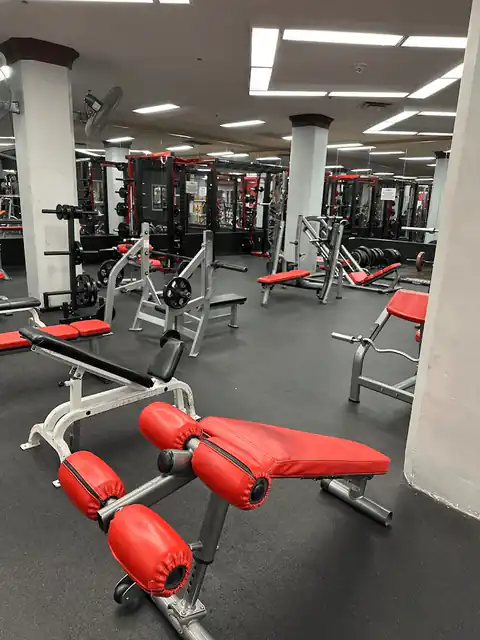 Weight benches and iron floor at Vine Fitness